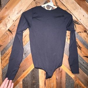 Skims long sleeve thong body suit